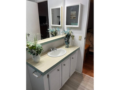 Welcome to this well kept 2 bedroom, 2 bathroom manufactured - photo 19