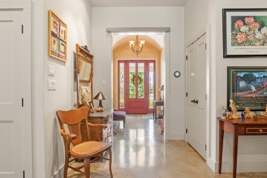 Experience refined living in this Durst-built custom home where