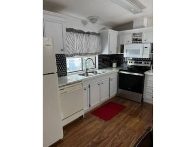 Welcome to this well kept 2 bedroom, 2 bathroom manufactured - photo 28