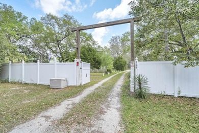 Set on 4.63 cleared acres along a paved county road, this unique - photo 36