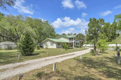 Set on 4.63 cleared acres along a paved county road, this unique - photo 37