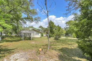 Set on 4.63 cleared acres along a paved county road, this unique - photo 39