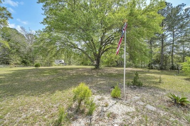 Set on 4.63 cleared acres along a paved county road, this unique - photo 41