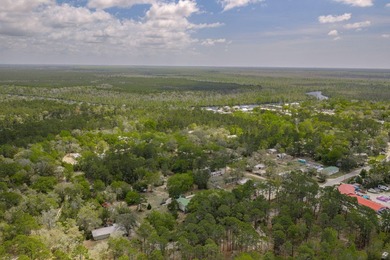 Set on 4.63 cleared acres along a paved county road, this unique - photo 46