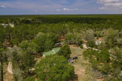 Set on 4.63 cleared acres along a paved county road, this unique - photo 48