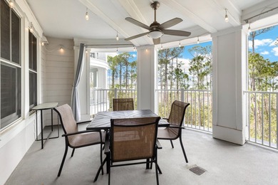 Second-floor bayfront condo with elevated positioning that - photo 1