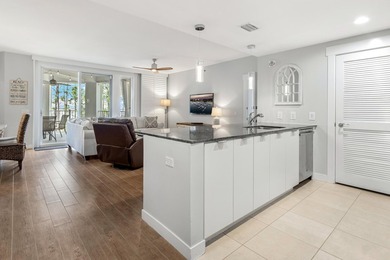 Second-floor bayfront condo with elevated positioning that - photo 4