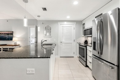 Second-floor bayfront condo with elevated positioning that - photo 5