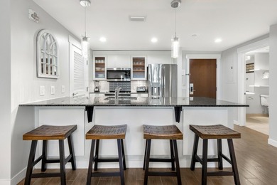Second-floor bayfront condo with elevated positioning that - photo 7
