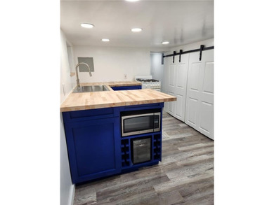 Beautiful 1 family property was converted from a 2 family in the - photo 9