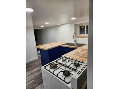 Beautiful 1 family property was converted from a 2 family in the - photo 10
