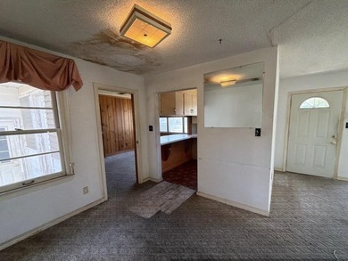 Located just a few miles from the bustling down town area and - photo 2