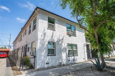 Priced to sell! This well-performing 10-unit building is located - photo 2