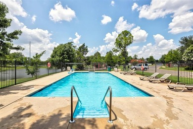 Nestled within a gated community offering a neighborhood pond - photo 33
