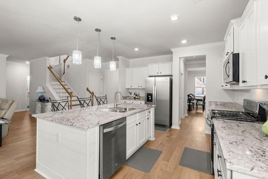 Welcome home to the postcard-perfect community of The Ponds - photo 11