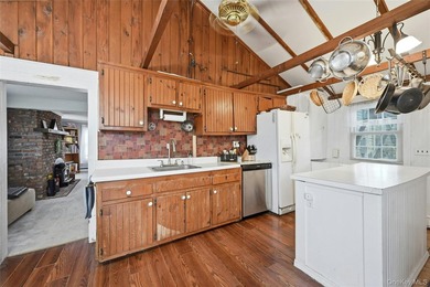 This charming Center Moriches 4/5-bedroom Colonial dates back to - photo 12