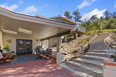 Welcome to this beautifully remodeled Prescott estate on over 2
