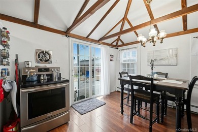 This charming Center Moriches 4/5-bedroom Colonial dates back to - photo 15