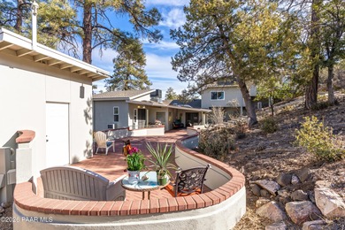 Welcome to this beautifully remodeled Prescott estate on over 2