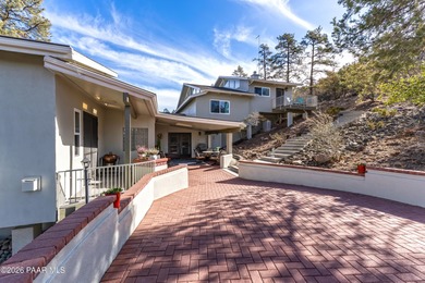 Welcome to this beautifully remodeled Prescott estate on over 2