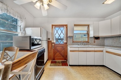 Welcome To This 3 Bedroom, 1 Bath Cape Style Home In Merrick! - photo 18
