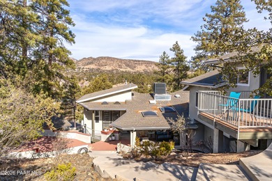 Welcome to this beautifully remodeled Prescott estate on over 2