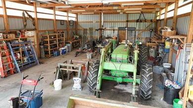 Tucked away at the end of a quiet dead-end road, this - photo 28
