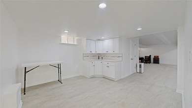 SHOWING BY APPOINTMENT ONLY CALL THE LISTING AGENT 987 E 42nd St - photo 36