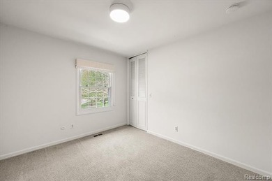 Welcome to this desirable end-unit condo in Bloomfield Hills - photo 27