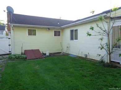 Well-maintained 3-bedroom, 2-bath expanded ranch featuring - photo 13