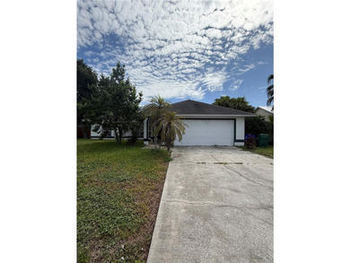 FIXER UPPER.....Opportunity awaits in the heart of Sebastian! - photo 1