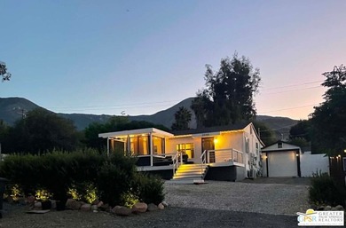 This lake view 3-bedroom, 2-bath home sits on a generous 50' x - photo 1
