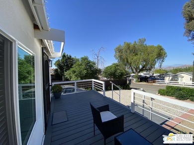 This lake view 3-bedroom, 2-bath home sits on a generous 50' x - photo 5
