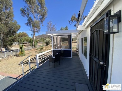 This lake view 3-bedroom, 2-bath home sits on a generous 50' x - photo 6