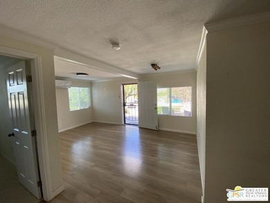 This lake view 3-bedroom, 2-bath home sits on a generous 50' x - photo 9