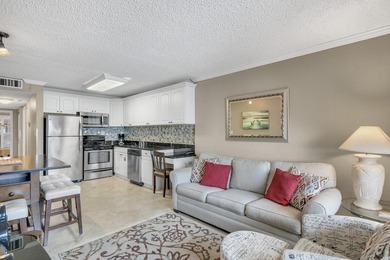 Jetty East is a Gulf front Gated 6-story midrise with under - photo 4