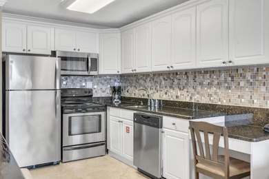 Jetty East is a Gulf front Gated 6-story midrise with under - photo 5