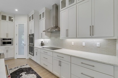 PRIVACY ABOUNDS IN THIS CUL-DE-SAC POOL HOME NESTLED ON AN - photo 31