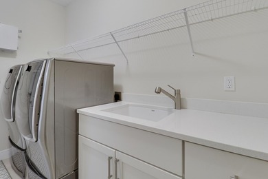 PRIVACY ABOUNDS IN THIS CUL-DE-SAC POOL HOME NESTLED ON AN - photo 59