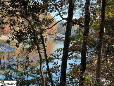 Stunning 6+ acre with new dock lot in the gated community of - photo 1