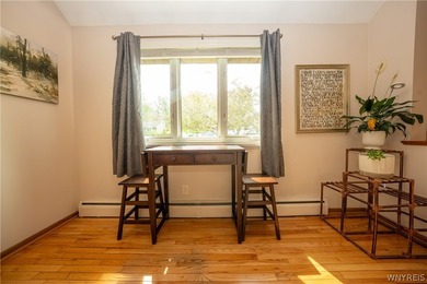 Welcome home to this inviting 4-bedroom, 1.5-bath residence - photo 9