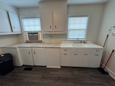 This 3-bedroom 1-bath home with spacious rooms and a unique - photo 17
