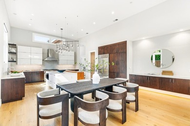 Welcome to this architectural masterpiece that seamlessly blends - photo 17