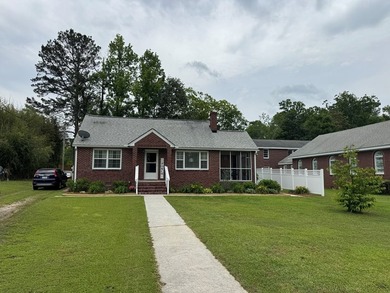 This 3-bedroom 1-bath home with spacious rooms and a unique - photo 26