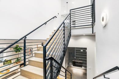 Welcome to this architectural masterpiece that seamlessly blends - photo 31