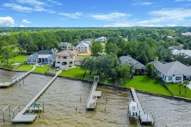 Discover Pelican Bay's Bayfront community, a serene, gated - photo 10