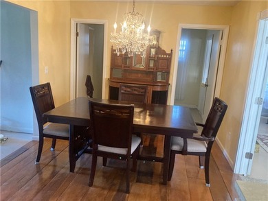 Discover the charm and potential of this spacious older home - photo 4