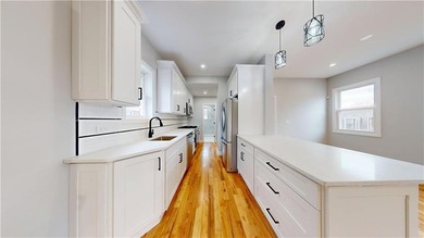 Move right into this fully gut renovated single family home - photo 8