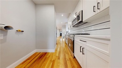 Move right into this fully gut renovated single family home - photo 9