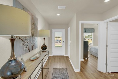 The Cali is an attractive one-story home with a spacious two-car - photo 4